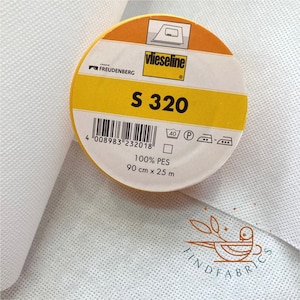 May include: A roll of white fusible interfacing labelled "vlieseline S 320" with a barcode, care instructions, and the text "100% PES 90 cm x 25 m".
