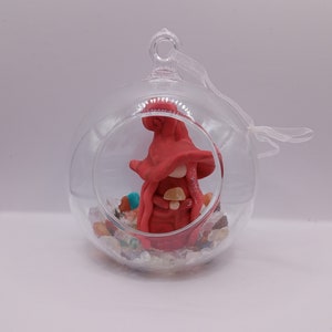 Little witch in a bauble