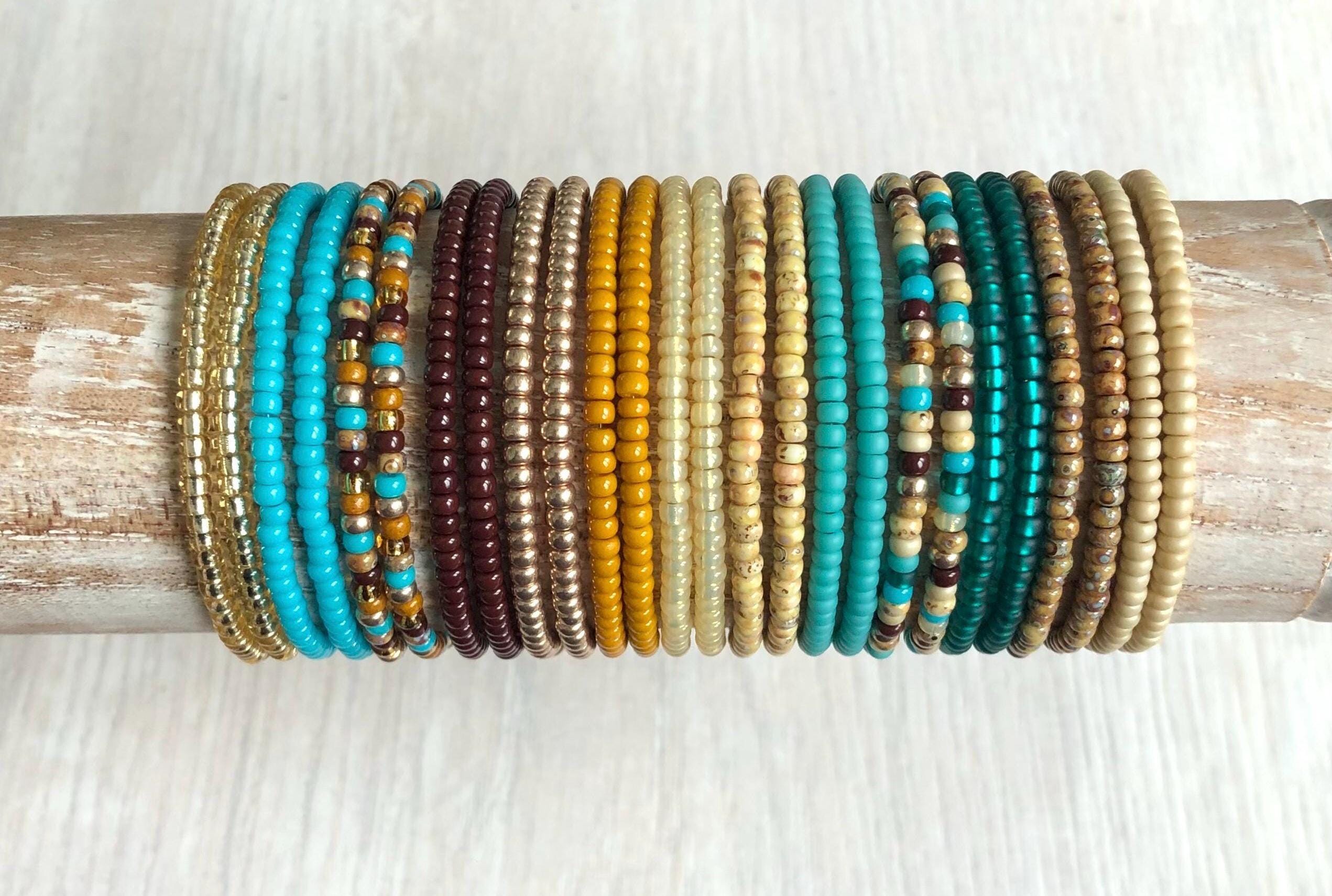 Bracelet de cheville extensible argenté orné de perles