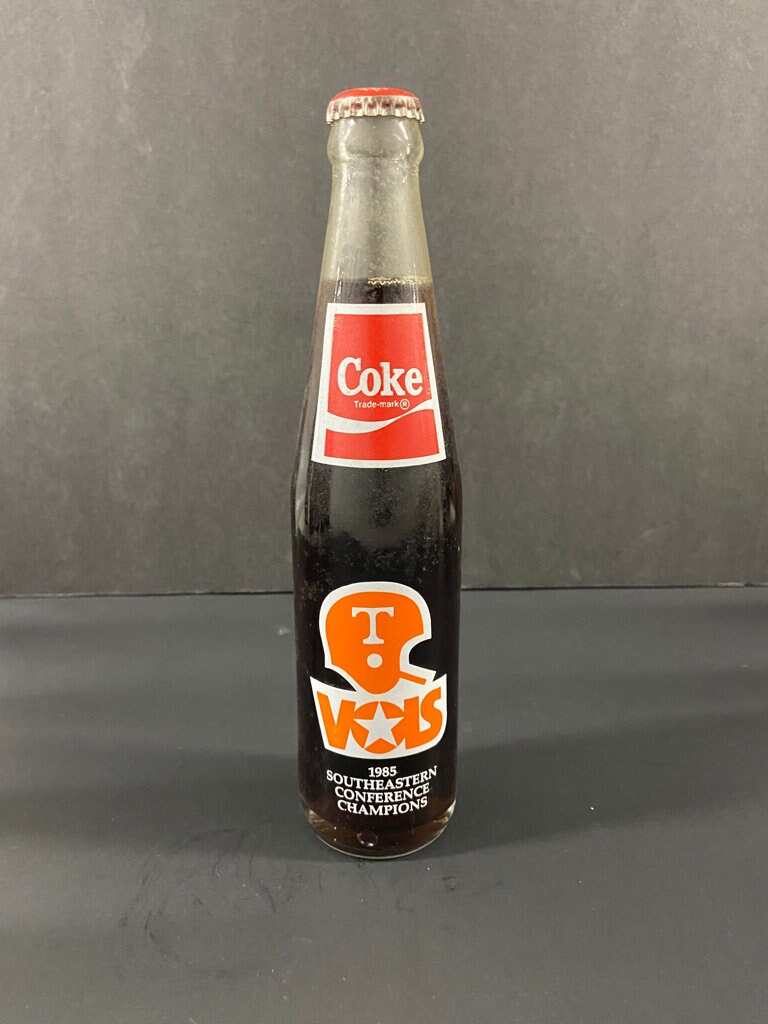 10 OZ COCA COLA COMMEMORATIVE BOTTLE - 1985 INGLES 100TH STORE OPENING