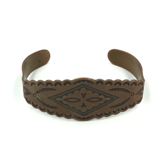 copper bell bracelet