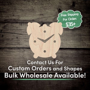 May include: A wooden alarm clock cutout with a brown woodgrain finish. The clock face has a simple design with a single hand pointing to the 12. The text "Contact Us For Custom Orders and Shapes Bulk Wholesale Available!" is below the clock.
