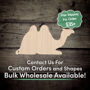 May include: A wooden cutout of a camel in a light brown color, lying down on a woodgrain background. The text "Free Shipping For Orders $35+" is in a green speech bubble above the camel. The text "Contact Us For Custom Orders and Shapes Bulk Wholesale Available!" is below the camel.