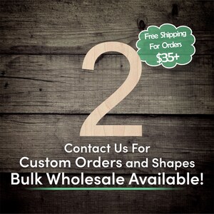 May include: A wooden number two cutout on a woodgrain background. The text "Free Shipping For Orders $35+" is in a green speech bubble. The text "Contact Us For Custom Orders and Shapes Bulk Wholesale Available!" is below the number.