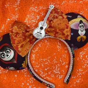 Coco guitar mickey ears!