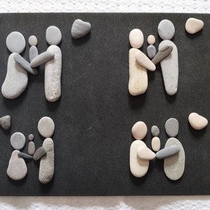 Ciottoli pietre ciottoli set di ciottoli persone coppia famiglia genitori amanti madre felicità bambino amore madre padre in grigio beige 479