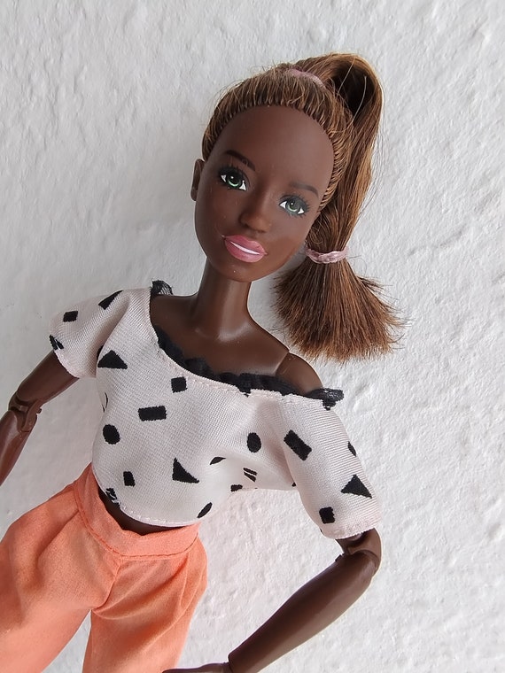 Barbie made to move african american on sale