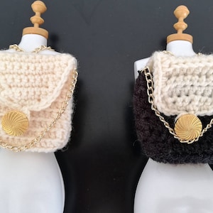 Doll bag 2 in 1 backpack and handbag in black and white or white with decoration and chain strap in gold