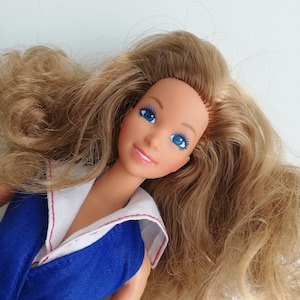 Muñeca barbie mattel online familia cuidado de cachorro