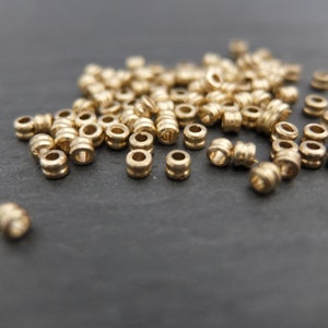 Perline in ottone con scanalatura 2,5 x 3 mm, perline per bigiotteria, macramè e acchiappasogni *650