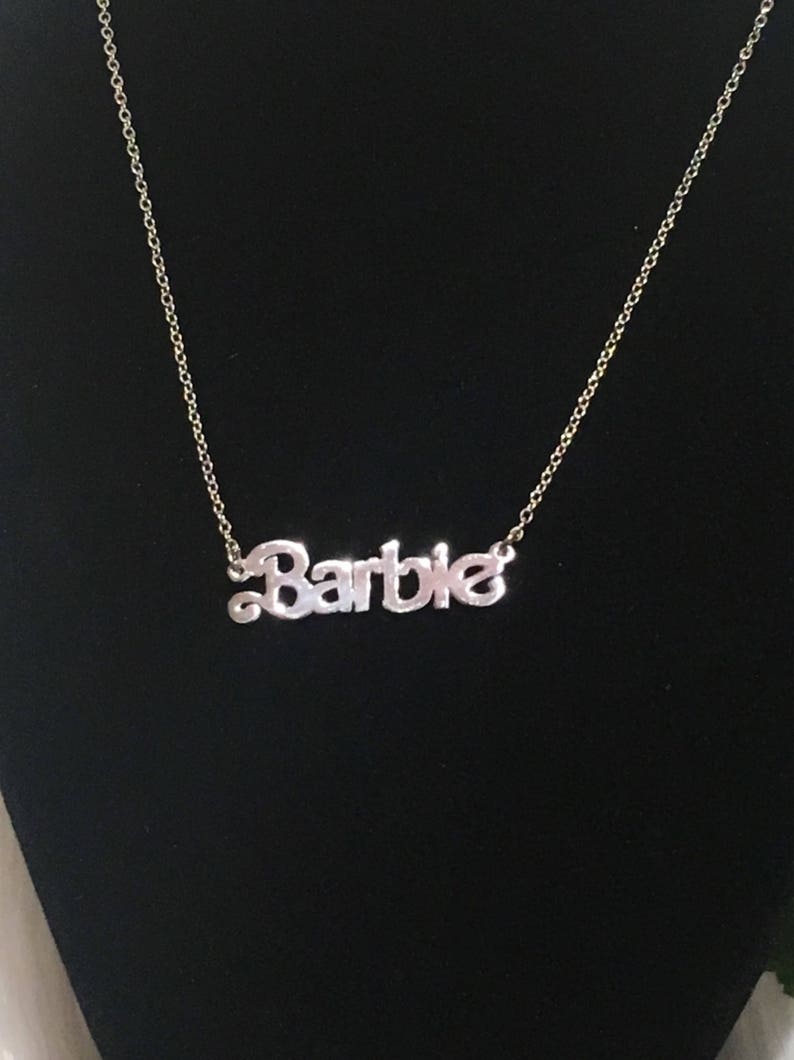 barbie logo necklace