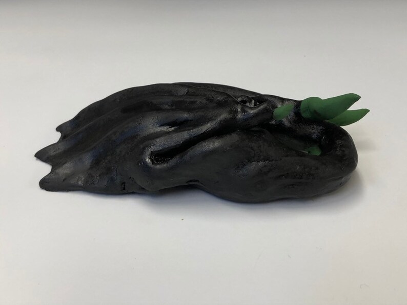 cute sleeping ceramic dragon figure M\u00e1vros