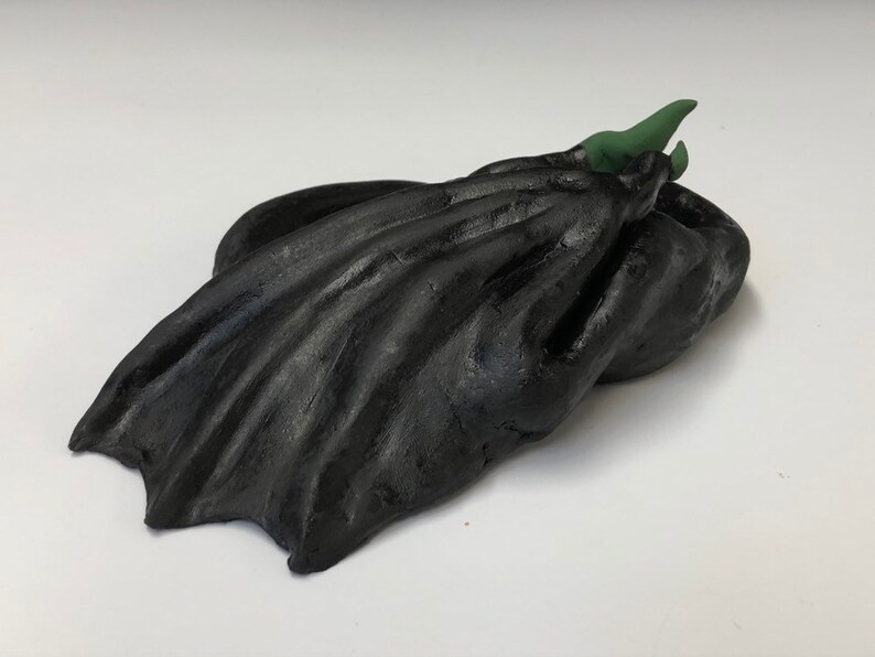 cute sleeping ceramic dragon figure M\u00e1vros