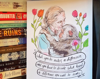 May include: Watercolor print featuring a woman embracing a primate, surrounded by colorful flowers. The print includes the quote, "what you do makes a difference and you have to decide what kind of difference you want to make."