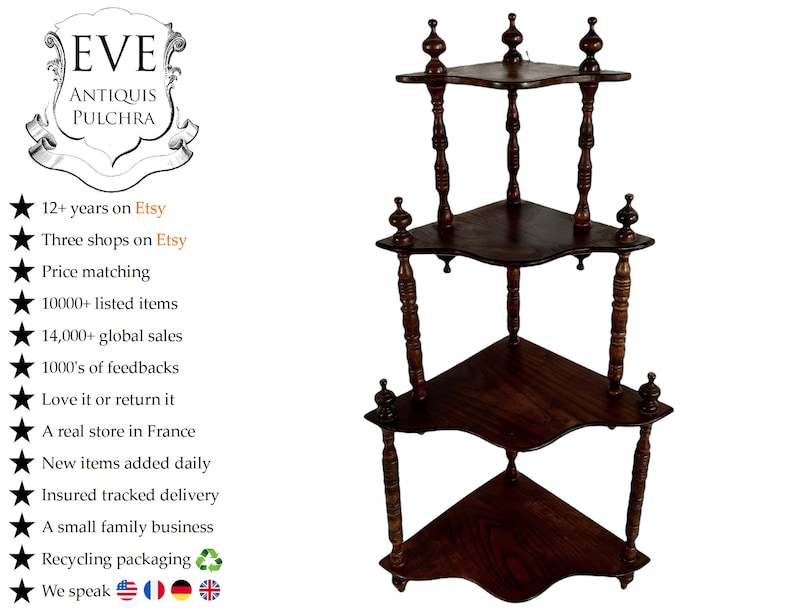 May include: A three-tiered corner shelf made of dark wood with turned spindles and decorative finials. The shelf has a scalloped edge and is perfect for displaying small items.