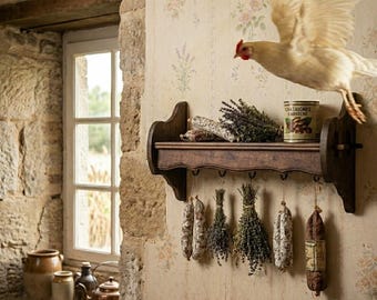 May include: A rustic wooden shelf displays dried herbs, sausages, and a can of chestnuts. A white chicken with outstretched wings hovers above the shelf. The scene is set against a floral wallpaper and a stone wall.