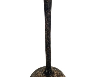 May include: A black wooden hat stand with a wide, round top and a tall, slender stem. The stand has a rounded base.
