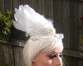 White wings and golden stag fascinator