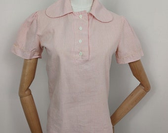 Blusa rosa con rayas color caramelo estilo años 30