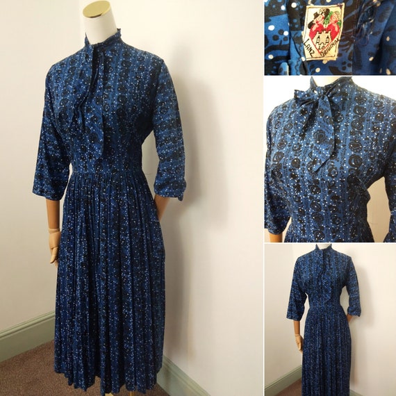 1950s blue pussy bow dress