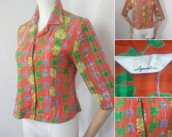 1950s Orange print blouse