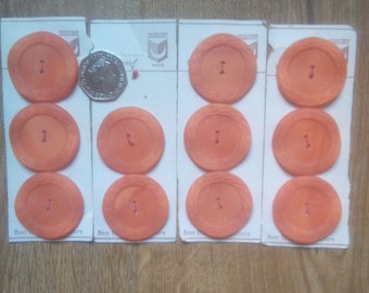 Vintage orange buttons