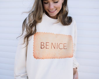 Be Nice Women’s Biscuit Graphic Sweatshirt