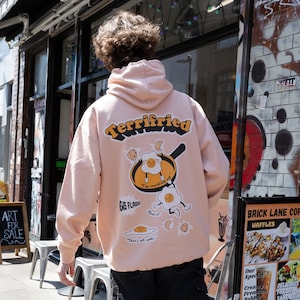 Terrifried Unisex Fried Egg Hoodie in Peach