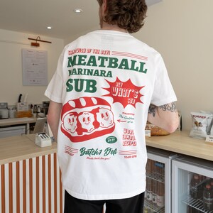 Camiseta gráfica unissex Meatball Marinara Sub em branco