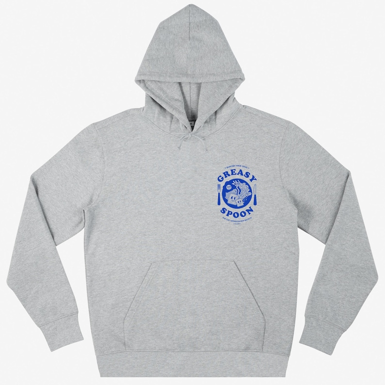 May include: A gray hooded sweatshirt with a blue logo that says "Greasy Spoon" and features a plate with a fork and knife, a steaming bowl of food, and a spoon.