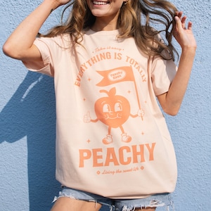 Everything Is Peachy Graphic T-Shirt in Peach