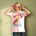 see more listings in the Women's T-Shirts section