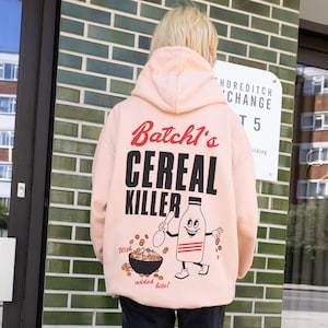 Cereal Killer Unisex Graphic Hoodie in Peach