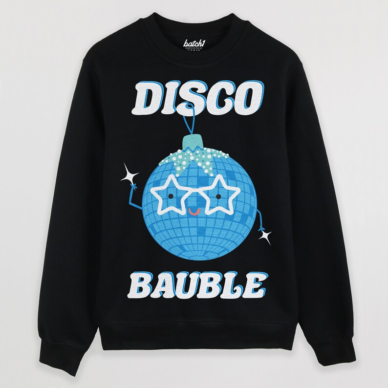 May include: Black sweatshirt with a blue disco ball ornament wearing sunglasses and the text "DISCO BAUBLE" printed on the front.