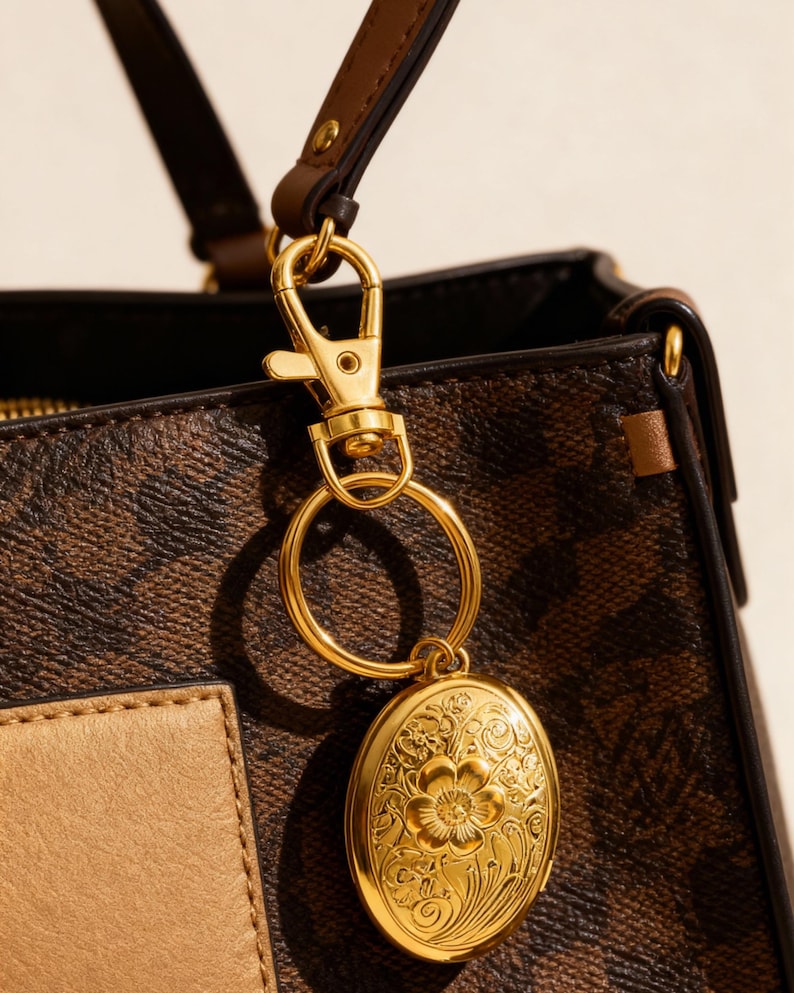 Vintage Inspired Photo Locket Key Chain Bag Charm Gold Plated Metal Frame Oval Design Classic Memory Keeper Heirloom Quality Construction Swivel Clasp Attachment Beautiful Photo Display Elegant Fashion Accessory Gift Idea