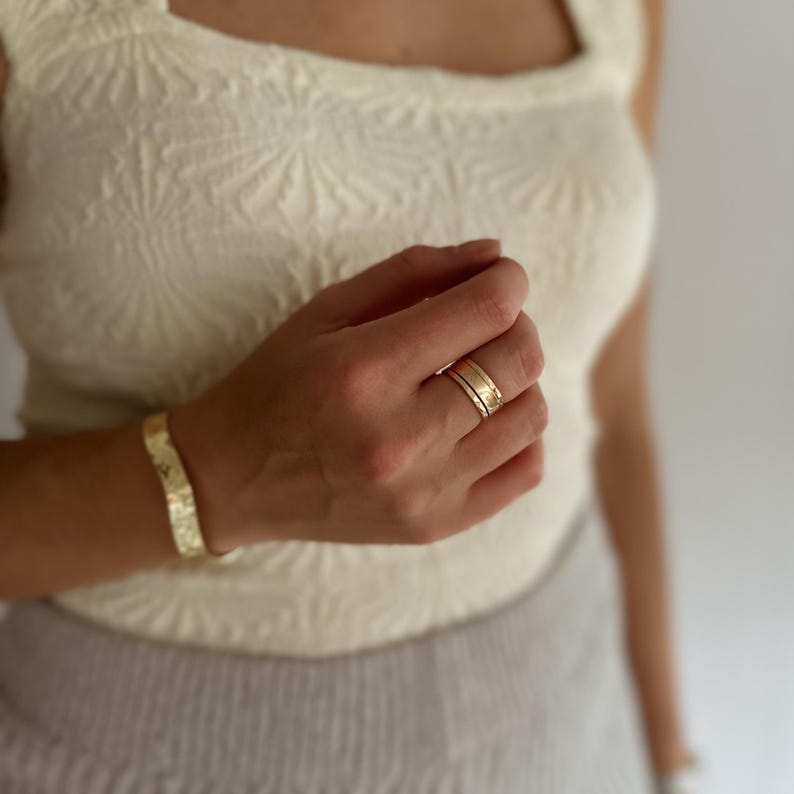 Hammered Gold Cuff Bracelet Wave Pattern Design Statement Fashion Piece Adjustable Size Band Modern Style Essential Beautiful Artisan Details Elegant Metal Construction Perfect Gift Choice Everyday Wear
