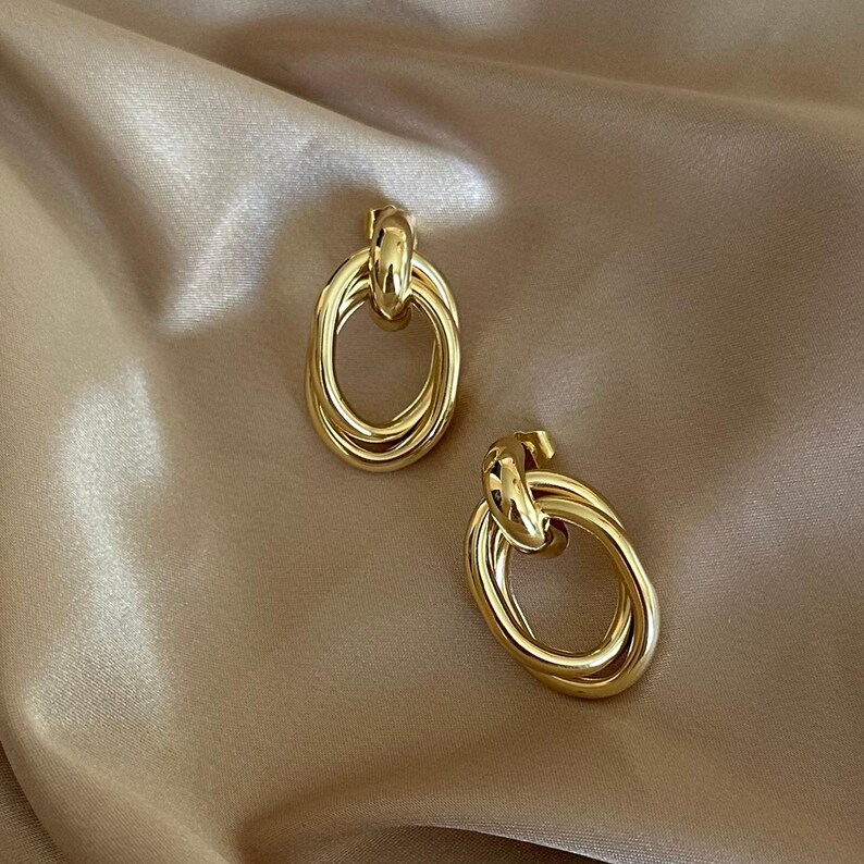 Statement Earring Gift Gold Twisted Hoops Elegant Birthday Present Special Occasion Jewelry Bold Fashion Accessory Wedding Day Style Bridesmaid Gift Idea Oval Design Feature Thick Wire Detail Quality Construction Stylish Modern Look