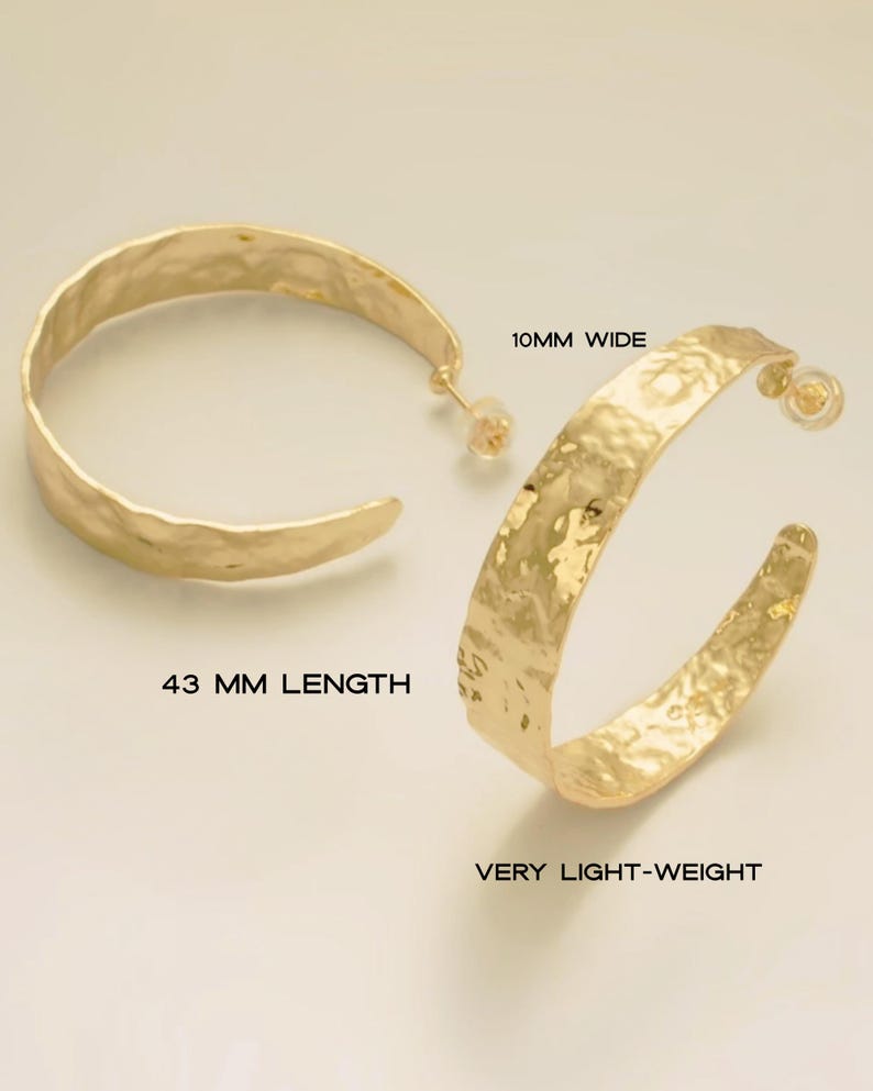 May include: Gold-toned hoop earrings with a hammered texture. The earrings are 43 mm in length and 10 mm wide. The text on the image says "VERY LIGHT-WEIGHT".