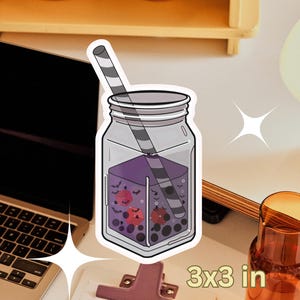May include: A sticker featuring a jar of purple bubble tea with a striped straw. The jar is filled with boba and small red fruit shapes. The sticker measures 3x3 inches.