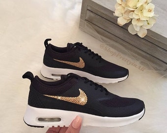 nike thea gold