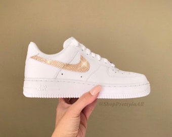 nike trainers with rose gold tick