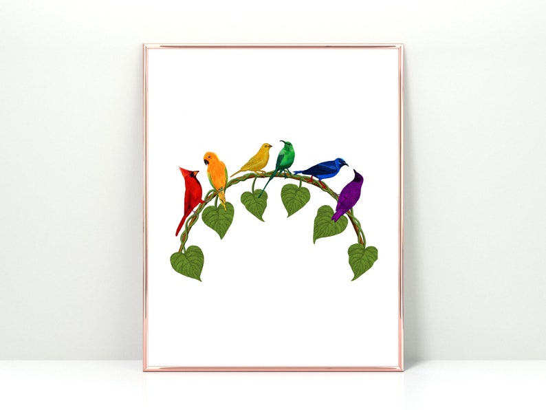 May include: A framed art print depicting seven vibrantly coloured birds on a green vine. The birds are red, orange, yellow, green, blue, and purple. The artwork has a white background and a rose gold frame.