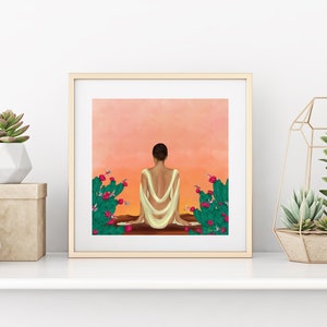 May include: A digital illustration of a person sitting with their back to the viewer, wearing a white flowing garment. The person is surrounded by green cactus plants with pink flowers. The background is a soft orange sunset.