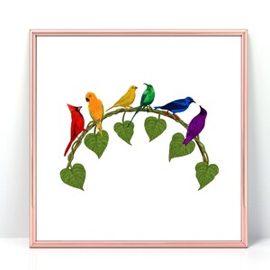 May include: A framed print showing seven brightly coloured birds on a leafy vine. The birds are red, orange, yellow, green, blue, and purple, set against a white background. The frame is rose gold in colour.