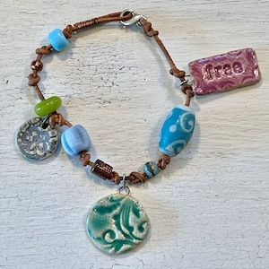 Handmade Boho Pottery and Leather Bracelet with Trade Beads, Charm &quot;Free,&quot; Colorful