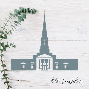 May include: A gray silhouette of a temple with a tall spire on a white wood background. The text "lds temples by miss mandee" is at the bottom of the image.