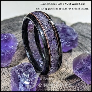 May include: A black and copper ring with a band of amethyst gemstones. The ring is 6mm wide and is shown in size 8 1/2. Example Rings: Size 8 1/2US Width 6mm Full list of gemstone options can be seen in shop.