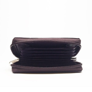 May include: Open brown zipped wallet with multiple card slots. The wallet is made of a smooth material and has a dark brown colour. The zip is open, revealing the interior card slots.