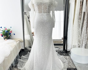 Fully beaded wedding gown with overskirt