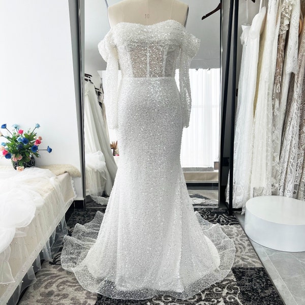 Fully beaded wedding gown with overskirt